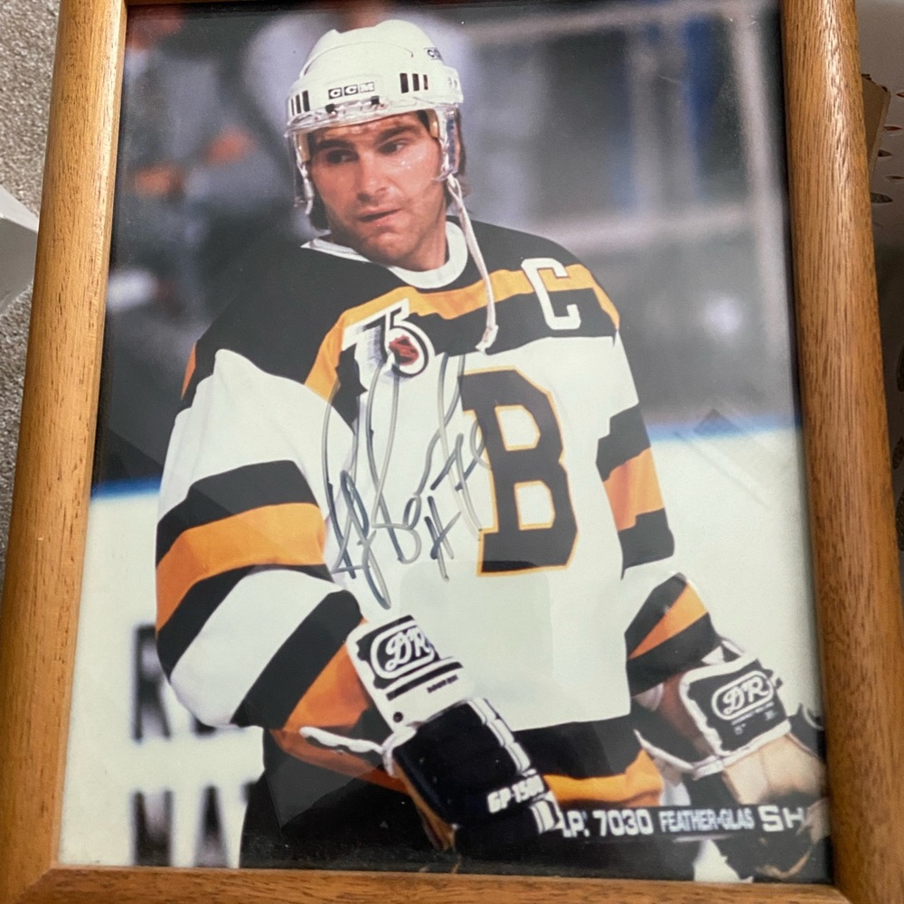 Framed Ray Bourque signed 8x10 photograph. No COAD.